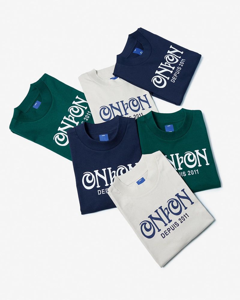 
                  
                    Nouveau Logo T-Shirt - Navy
                  
                