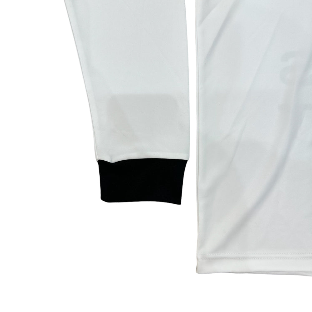 
                  
                    Blonde football jersey, white
                  
                