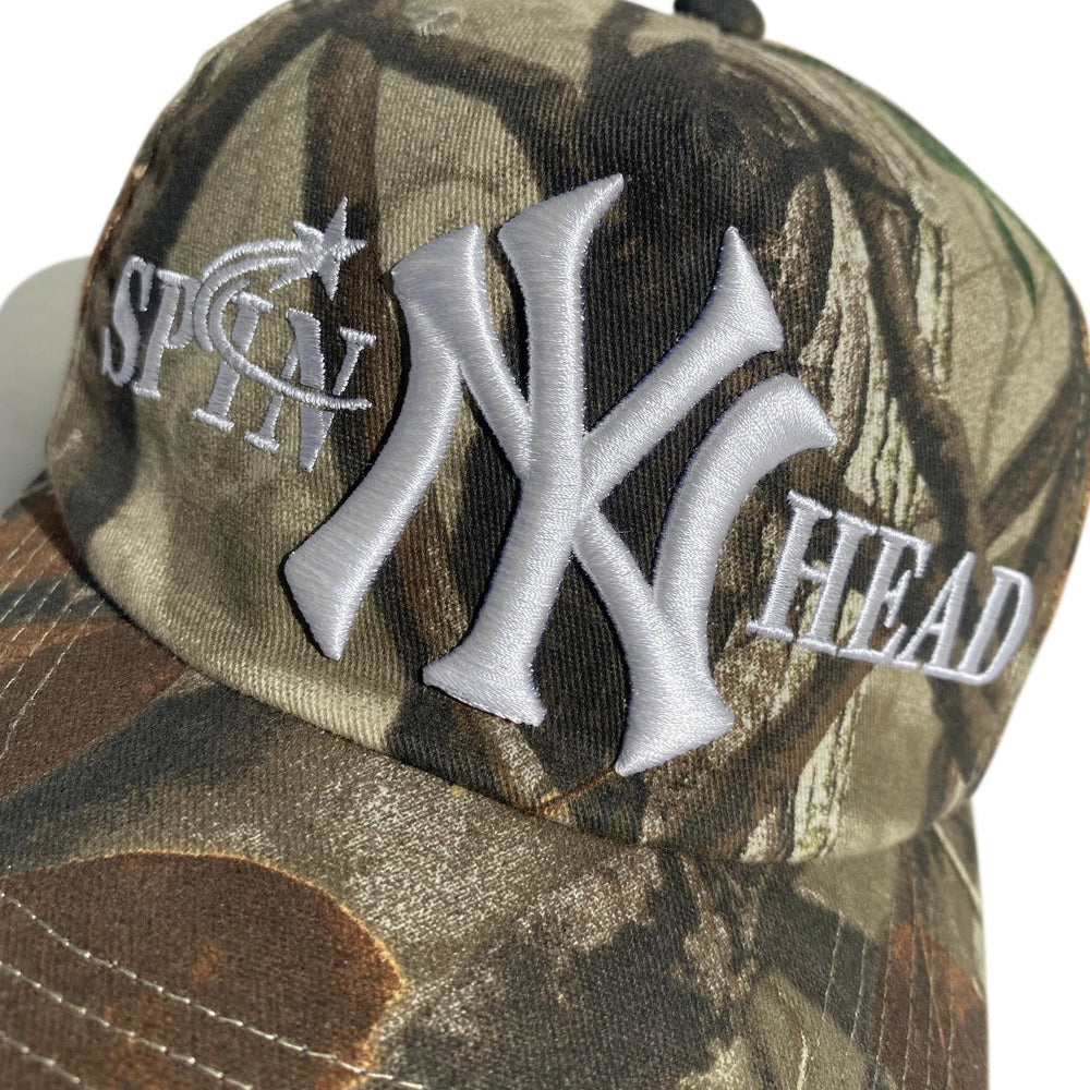 
                  
                    Spinny Head Camo Hat
                  
                