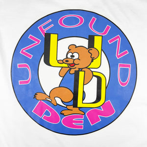 
                  
                    DEN SOUVENIR x UNFOUND PROJECT bear tee
                  
                