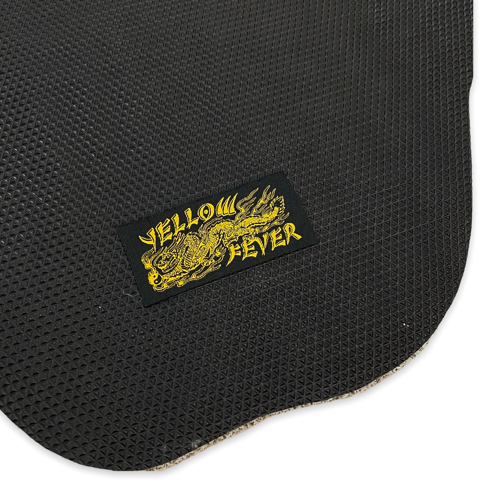 
                  
                    Yellow Fever Skull Mat, White
                  
                