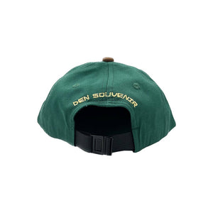 
                  
                    Den Golden triangle cap, green brown
                  
                