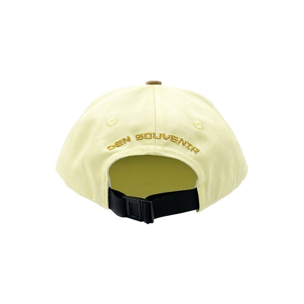 
                  
                    Den Golden triangle cap, yellow brown
                  
                