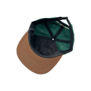 
                  
                    Den Golden triangle cap, green brown
                  
                